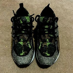 Steve Madden fashion sneakers. Covered in sparkly stones. Worn only 2 times.